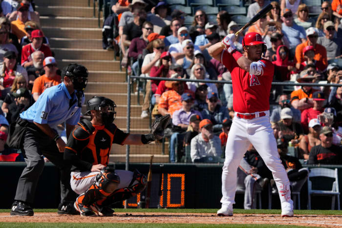 Los Angeles Angels center fielder Mike Trout hits against the SF Giants in the third inning at Tempe Diablo Stadium. (2023)